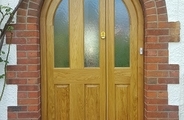 Oak door with a curved head