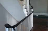 Finished staircase with curved handrail 3